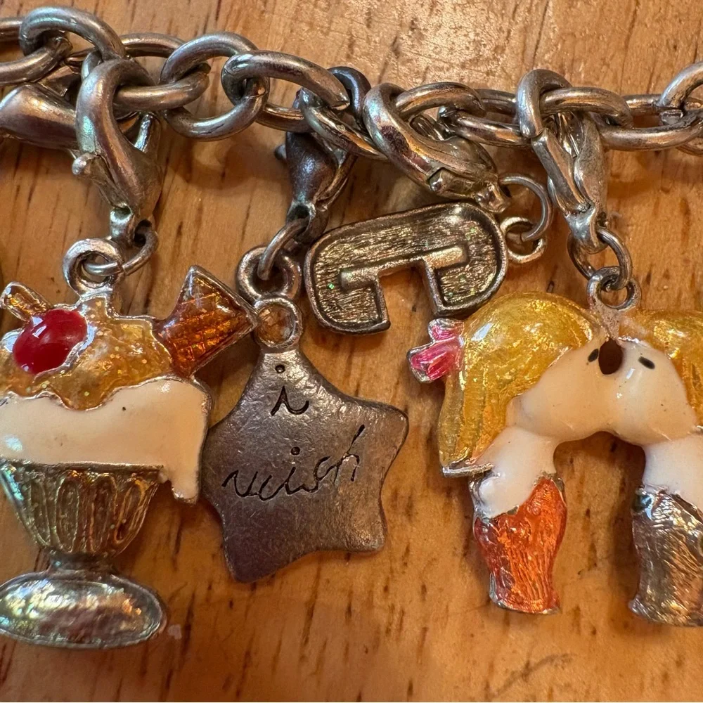 Claires silver charm